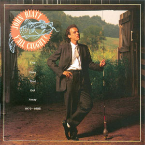 Álbum Y'All Caught? (The Ones That Got Away 1979-1985) de John Hiatt